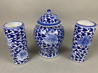 Three Pieces Of Asian Themed Porcelain Including 2 Vases And Lidded Jar With Blue & White Floral Design
