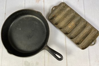 2 Heavy Cast Iron Pieces Including A Cornbread Pan And An 11' Handled Skillet