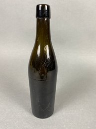 Three Piece Antique Wine Bottle Circa 1880 In A Dark Olive Green Color
