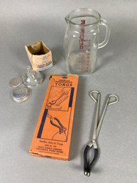 Collection Of Vintage Evenflo Pitcher, Davol Nursing Bottle Tongs, Glasco Funnel & Strainer