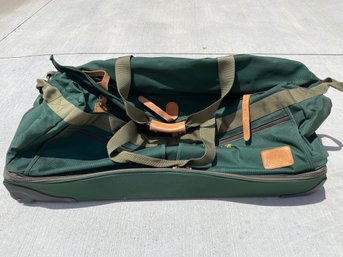 Very Nice Rolling Cabela's Canvas Duffel Bag With Handle, Leather Fasteners, & Zippered Bottom Compartment