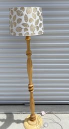 Lovely Wooden Floor Lamp With Gold And White Leaf Design Shade And Foot Switch