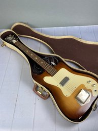 Very Nice Kay Electric Guitar In Hard Case With Beatles Sheet Music And An Amp Cord