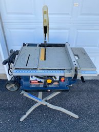 Portable Ryobi 10' Table Saw, Model BTS21, On Rolling Metal Stand