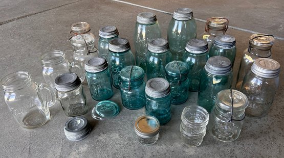 Assortment Of Blue And Clear Canning Jars And Food Storage Jars