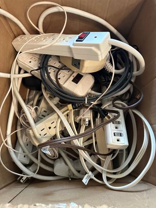 Large Assortment Of Extension Cords And Surge Protectors