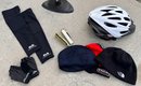 Cycling Collection Of Compression Sleeves, Gloves,  Beanies, Helmet,  And Tire Pump - Lot Of  7
