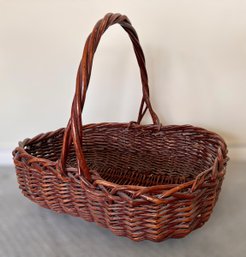 Large Mahogany In Color Wicker Basket