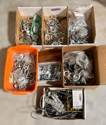 Assortment Of Various Eye Bolts And Rigid Single Pulleys