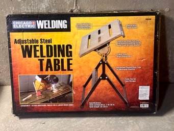 Unopened Chicago Electric Adjustable Steel Welding Table