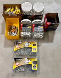 Huge Assortment Of Staples, Wall Anchors And Mini Screw Drivers