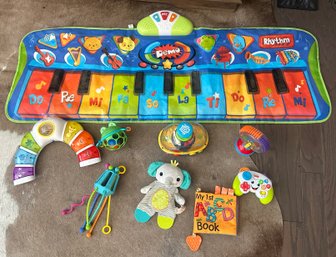 Collection Of Baby Noise Making And Chewable Toys