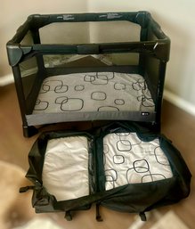 Black 4 Moms Pack N Play W/ Changing Table, Bassinet, And Diaper Storage Attachment