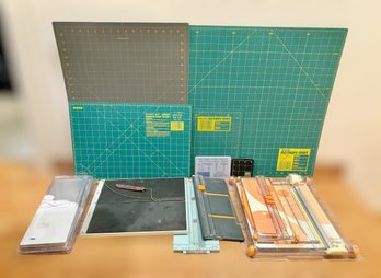 Assortment Of Paper Trimming Tools, Cutting Mats, & A Scor-it Board