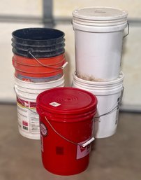 Assortment Of Buckets And Concrete