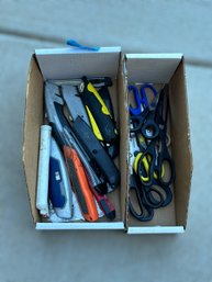 Assortment Of Box Cutters, Razors, And Scissors