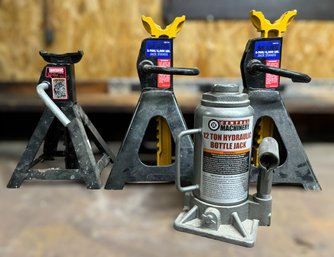 Set Of Jacks W/ 2.25 Ton Jack Stand, 3 Ton Jack Stands, & 12 Ton Hydraulic Bottle Jack - Lot Of 4