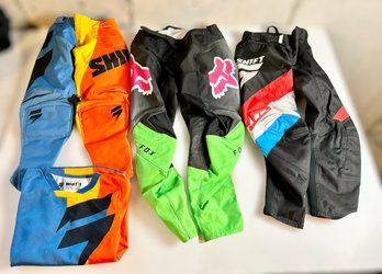 Assortment Of Youth Racing Clothing W/ 3 Pants & 1 Shirt - Lot Of 4