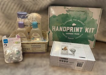 Collection Of Baby Bathtime Solutions, Pacifiers, Monitor, And Hand Print Kit