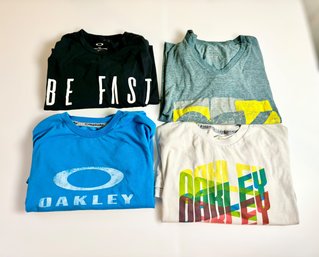 Collection Of Oakley T-shirts W/ Blue, Green, White, & Black Colors - Lot Of 4