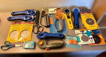 Collection Of Rotary Cutters And Unused Rotary Blades With Storage Organizer