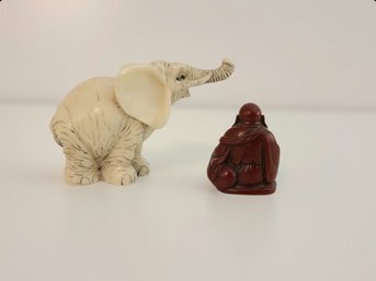 Small Smiling Redwood Buddha Figure And White Resin Elephant