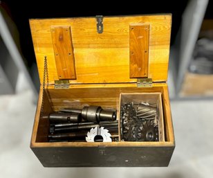 Wood Chest Filled With Gear Hob Cutters And Grinding Tool Attachments