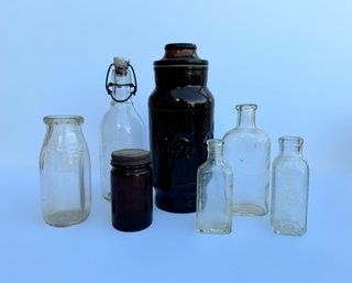 Vintage Collection Of Clear Glass Bottles And Amber Jars