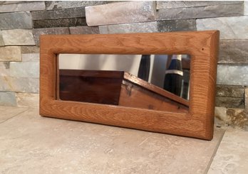 Classic Rectangular Mirror In A Beautiful Warm Honey Colored Wooden Frame