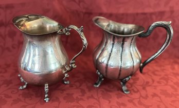 Lot Of 2 Silver Plate Footed Pitchers