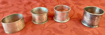 Lot Of 4 Varied Silver Plate Napkin Rings