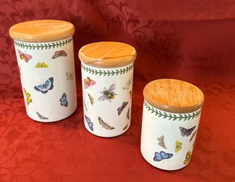 Three Ceramic Cannisters With Bee And Butterflydesign Wooden Lids