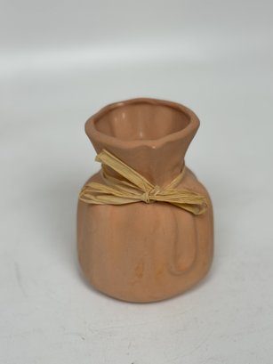 Decorative Terracotta Pitcher With Raffia Accent  Artisanal Aesthetic