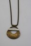 Contemporary Textured Brass Pendant With Metallic Accent On A Vintage Snake Chain