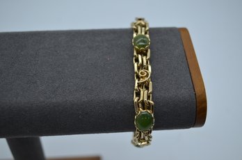 Vintage Gold-Tone Bracelet With Green Cabochon Stones