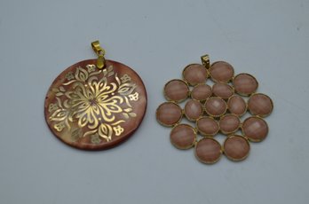 Artisan Crafted Pendants With Gold-Tone Detailing And Organic Motifs