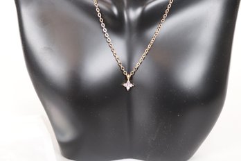 Elegant Gold-Tone Necklace With Diamond-like Pendant