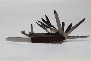 Vintage Victorinox Swiss Army Knife With Multiple Tools And Wooden Handle'