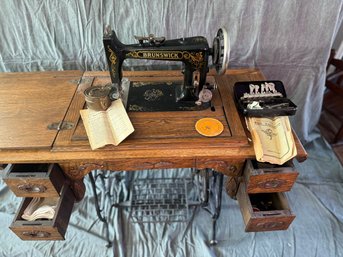 Antique Brunswick Treadle Sewing Machine In Quarter Sawn Tiger Oak Cabinet  Timeless Craftsmanship