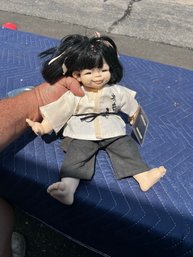 Oriental Doll With Passport
