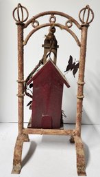 Wooden Bird House On A Metal Stand