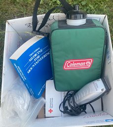 Box Of Camping Items With Coleman Waterbottle.