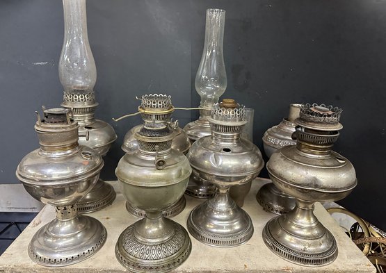 Group Of  Nickel Plated Fluid Lamps