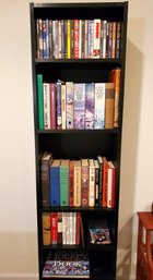 Book Shelf With Books And DVDs