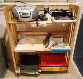 Sony Radio Canon Calculator And Other Office Wears On Shelving Unit