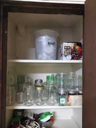 3 Shelves Of Canning Jars And Accessories