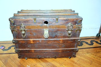 ANTIQUE WOOD CHEST - METAL DETAILS - LEATHER SIDE STRAPS - INSIDE COMPARTMENTS - WHEELS - ITEM#24 RM4