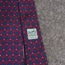 #3 NEAR MINT AND FANTASTIC HERMES MADE IN FRANCE NAVY BLUE AND RED CRYSTALIZED GEOMETRIC SILK MENS TIE