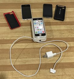 TESTED AND WORKING : LOT OF 2 VINTAGE APPLE A1349 IPHONE 4, 8GB IPHONE 5C, WALL CHARGER, MAC CORD, & CASE