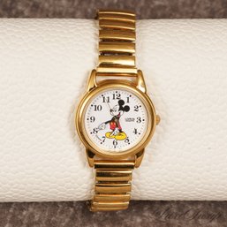 A GREAT CONDITION AND COLLECTIBLE VINTAGE LORUS QUARTZ MICKEY MOUSE GOLD TONE METAL STRAP WATCH